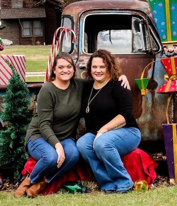 Though life can get hectic, sisters Katie Eslinger (left) and Alecia Jackson have always been close to each other.