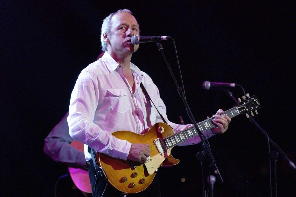 Knopfler performing with his band the Dire Straits (Yui Mok/PA) (PA Archive)
