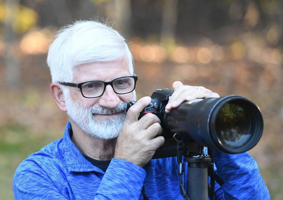 Bulletin photographer John Shishmanian is retiring after 43 years covering eastern Connecticut sports, news and features stories.