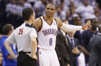 Oklahoma City Thunder guard Russell Westbrook (0) talks with official Pat Fraher (26) in the fourth quarter of Game 2 of the Western Conference semifinal NBA basketball playoff series against the Los Angeles Clippers in Oklahoma City, Wednesday, May 7, 2014. Oklahoma City won 112-101. (AP Photo/Sue Ogrocki)