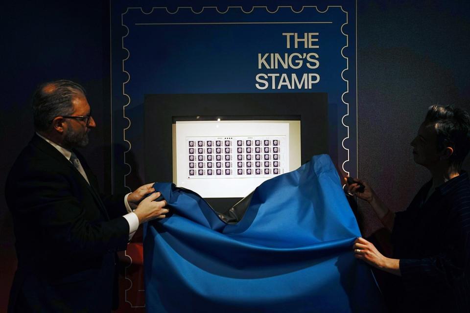 One of the first sheets of the 1st class definitive stamp featuring King Charles III is unveiled as it goes on display at the Postal Museum in central London