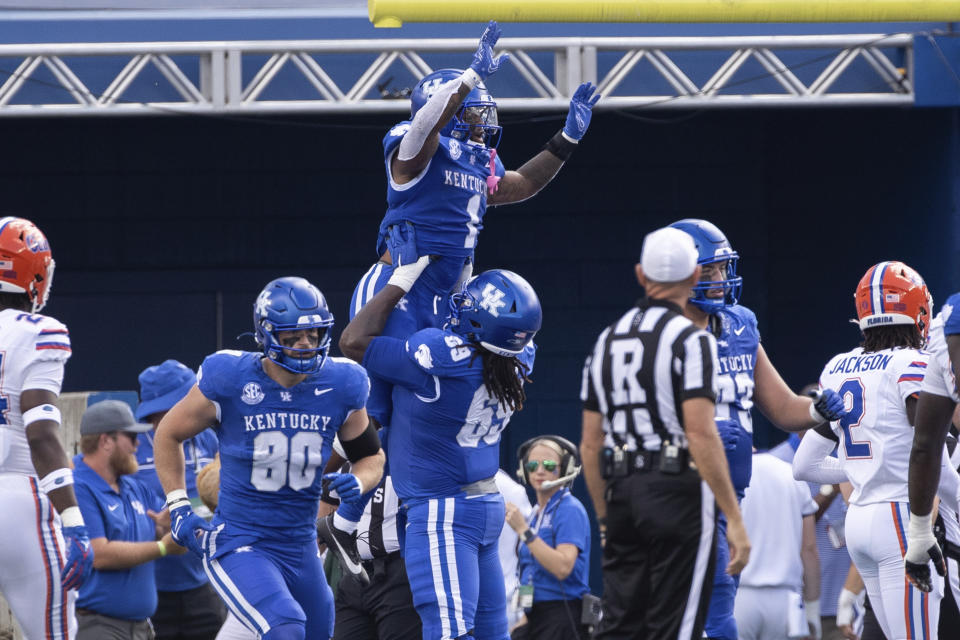 Kentucky running back Ray Davis (1) celebrates his touchdown in the end zone against Florida in Lexington, Ky., Saturday, Sept. 30, 2023. (AP Photo/Michelle Haas Hutchins)