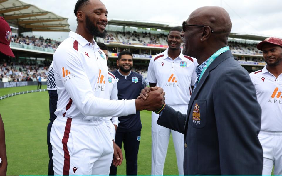 Mikyle Louis is presented with his Test cap by Sir Vivian Richards