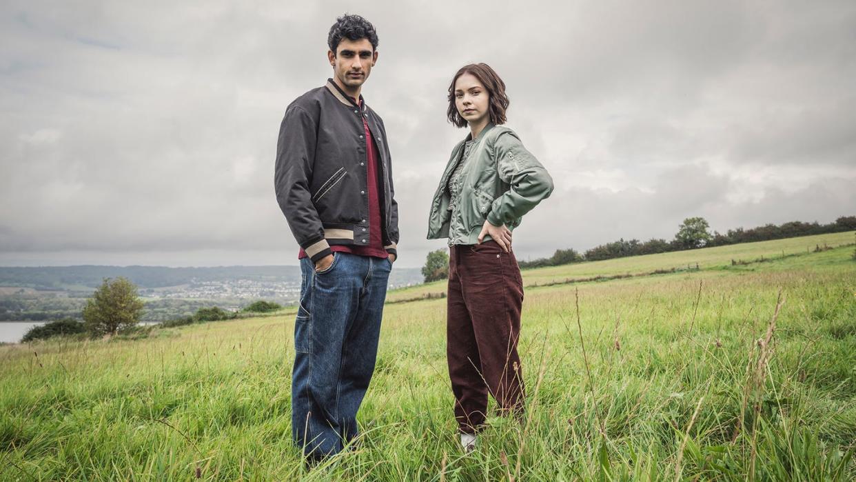 zain iqbal as ravi singh and emma myers as pip fitz amobi in a good girl's guide to murder