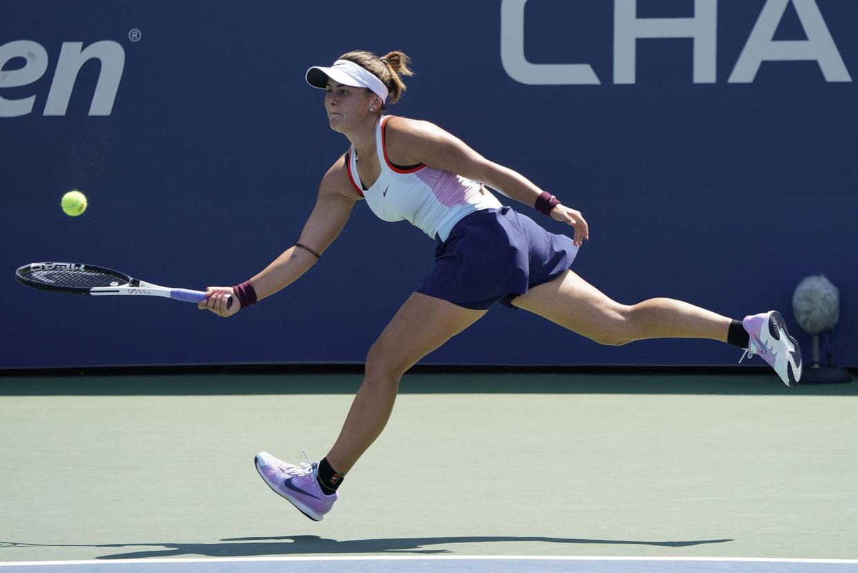 Bianca Andreescu, of Canada, returns a shot to Harmony Tan, of France, during the first round of the U.S. Open tennis championships, Monday, Aug. 29, 2022, in New York.