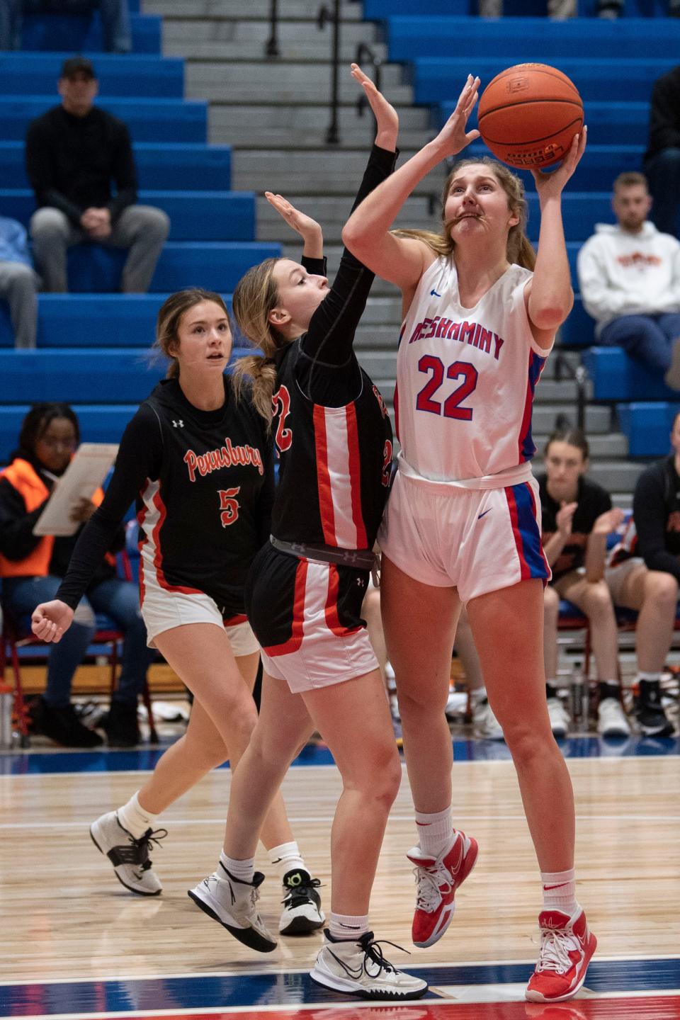 Neshaminy junior Reese Zemitis shoots through Pennsbury defense at Neshaminy High School on Tuesday, Jan. 24, 2023. Neshaminy fell to Pennsbury at home after overtime, 31-30.