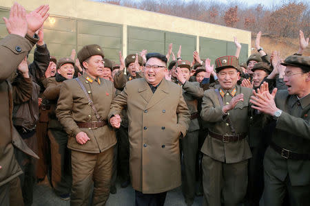 FILE PHOTO: North Korean leader Kim Jong Un watched the ground jet test of a Korean-style high-thrust engine newly developed by the Academy of the National Defence Science in this undated picture provided by KCNA in Pyongyang on March 19, 2017. KCNA/via Reuters/File Photo