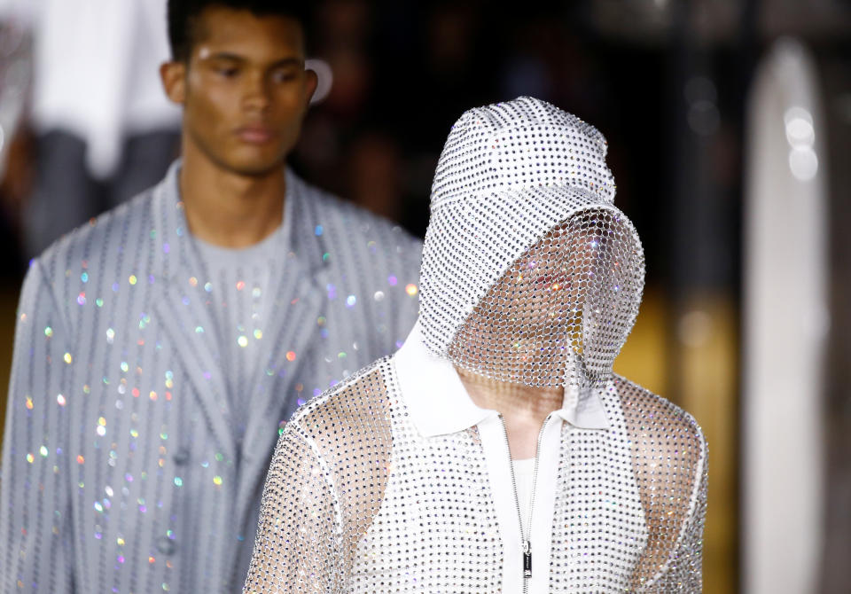 Models present creations during the Burberry catwalk show at London Fashion Week in London, Britain, September 16, 2019. REUTERS/Henry Nicholls