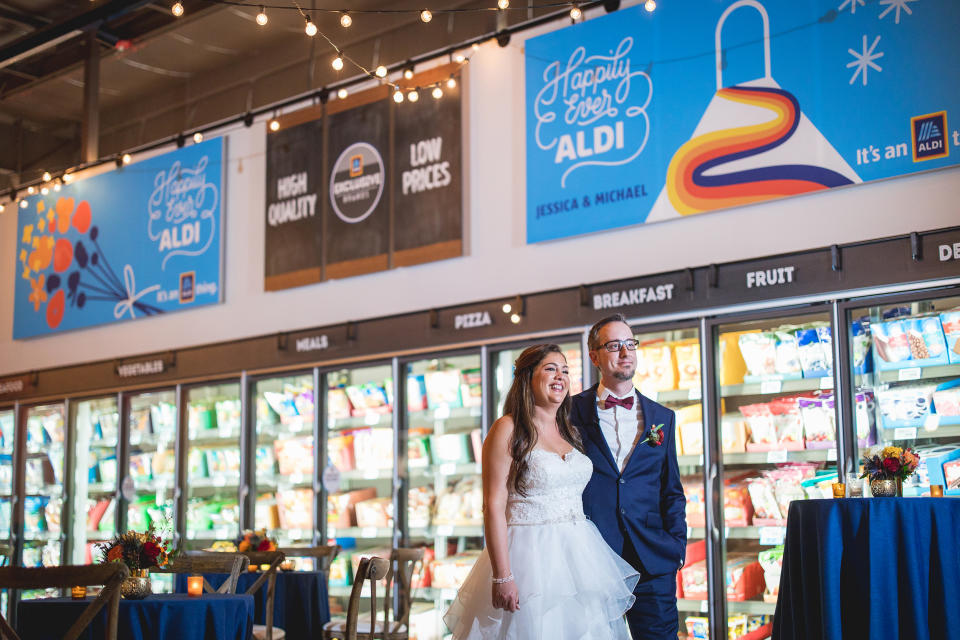 Mike and Jessica Hurd pose in an Aldi in Batavia, Illinois. (Courtesy Fig Media)