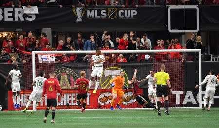 Dec 8, 2018; Atlanta, GA, USA; Portland Timbers forward Jeremy Ebobisse (17) goes up for a header against the Atlanta United in the 2018 MLS Cup championship game at Mercedes-Benz Stadium. Dale Zanine-USA TODAY Sports