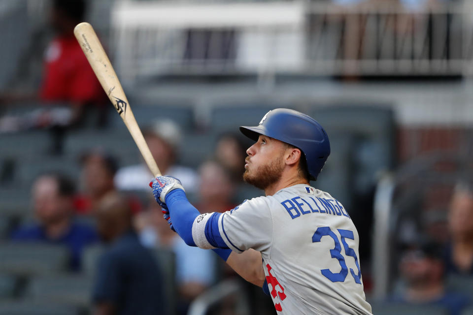 Los Angeles Dodgers' Cody Bellinger watches the flight of a solo home run in the first inning of a baseball game against the Atlanta Braves, Friday, Aug. 16, 2019, in Atlanta. (AP Photo/John Bazemore)