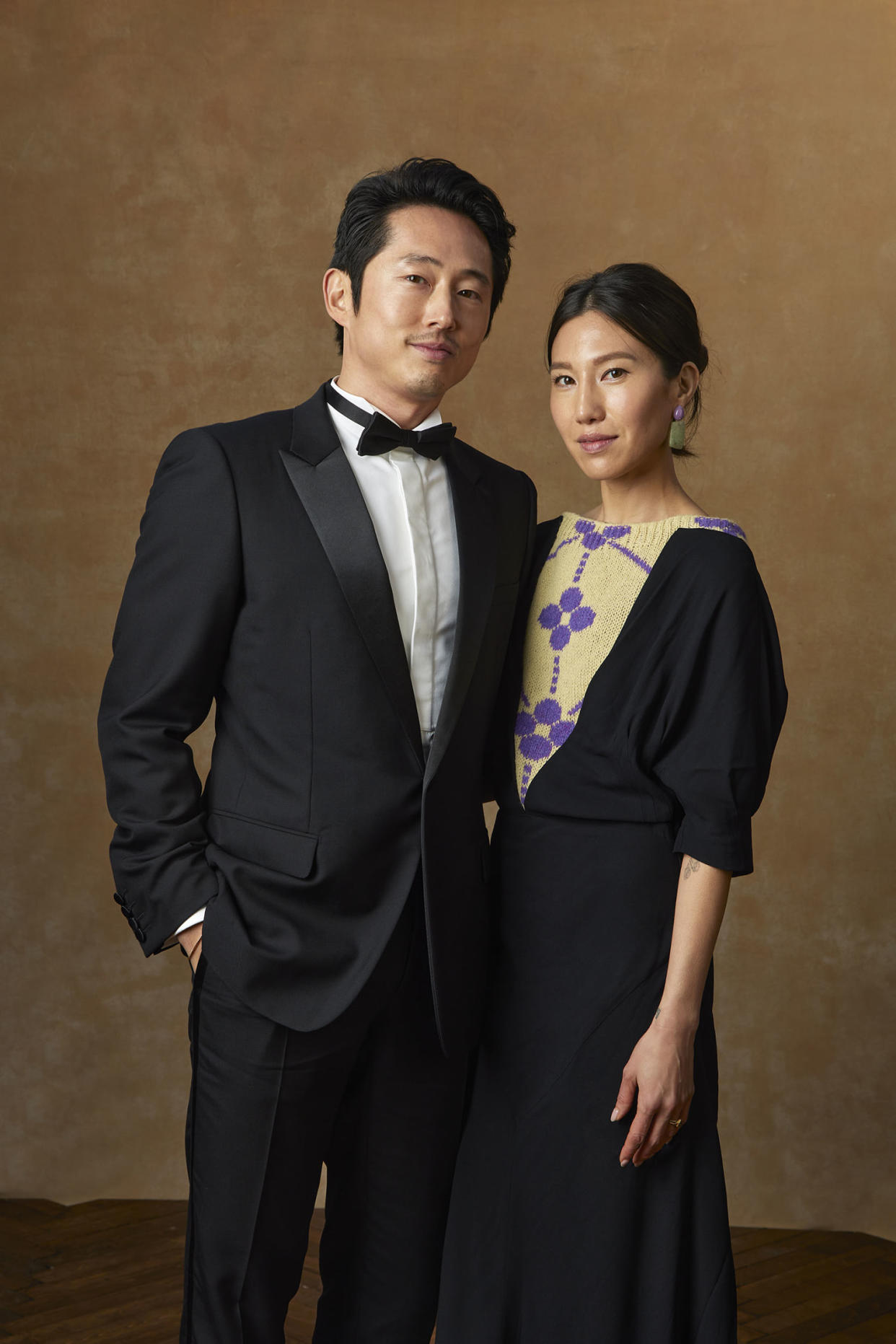 Steven Yeun and Joana Pak at the portrait booth at the 81st Golden Globe Awards held at the Beverly Hilton Hotel on January 7, 2024 in Beverly Hills, California.  (Dan Doperalski / Golden Globes 2024 via Getty Images)