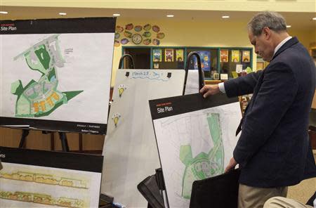 Jay M. Brotman, partner at Svigals + Partners looks at the updated design concept for the new Sandy Hook Elementary School in Newtown, Connecticut March 25, 2014. REUTERS/Michelle McLoughlin