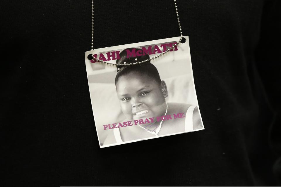 A photograph of 13-year-old Jahi McMath is seen on a necklace in Oakland, California in this December 24, 2013 file photo. (REUTERS/Stephen Lam/Files)