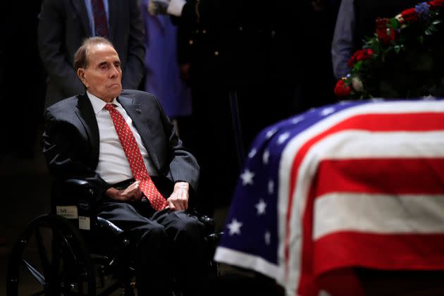 Dole pays his last respects to former President George H.W. Bush, his 1988 rival for the presidential nomination, at the Capitol in Washington in December 2018. (Photo: ASSOCIATED PRESS)