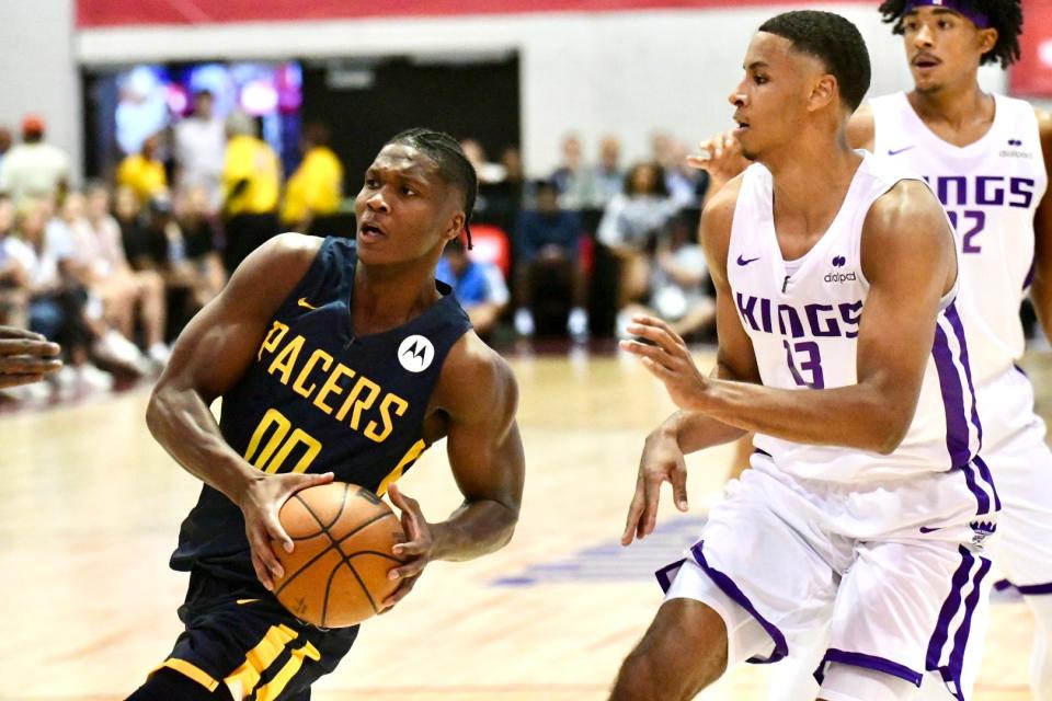 Indiana's Bennedict Mathurin, left, goes up for a shot while Sacramento's Keegan Murray defends as the Pacers face the Kings in a Summer League game at Cox Pavilion in Las Vegas on July 10, 2022.