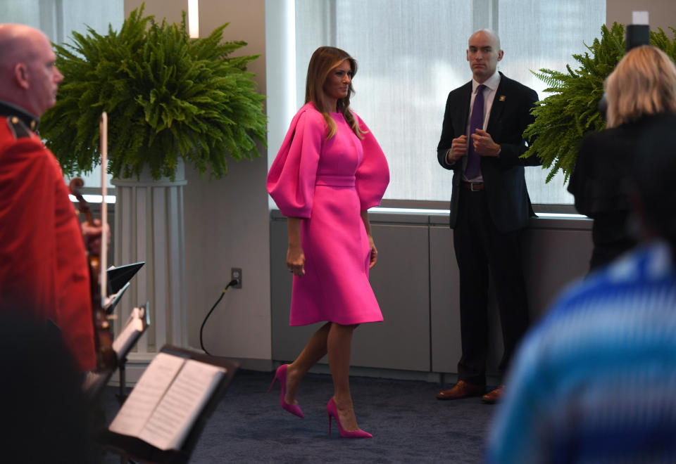 Social media critics disapproved of the fluorescent pink dress the first lady wore to give an anti-bullying speech at the United Nations. (Photo: Getty Images)