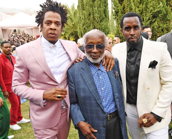 <p>Kevin Mazur/Getty</p> JAY-Z, Clarence Avant and Sean Combs