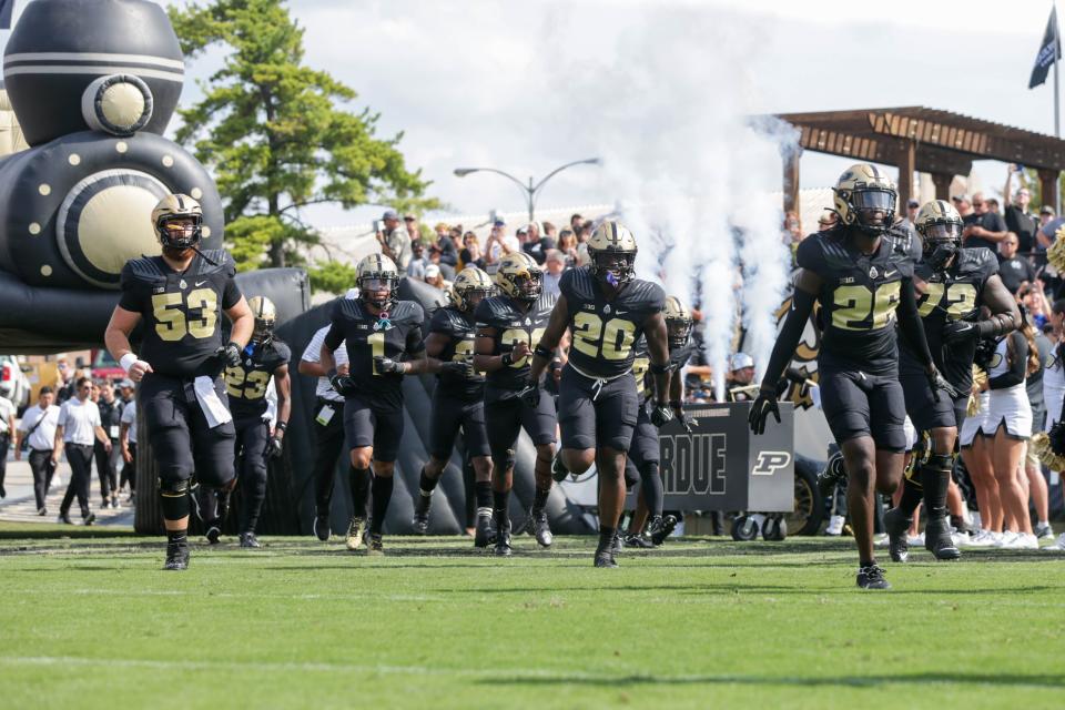 Purdue Boilermakers run onto the field before the NCAA football game, Saturday, Sept. 10, 2022, at Ross-Ade Stadium in West Lafayette, Ind.