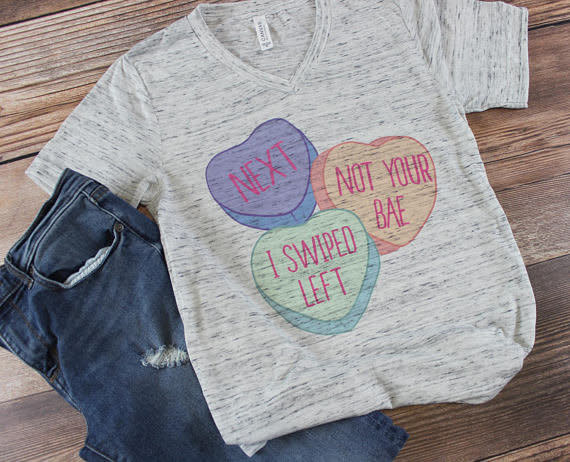 Get it <a href="https://www.etsy.com/listing/569210392/valentines-day-shirt-conversation-hearts?ga_order=most_relevant&amp;ga_search_type=all&amp;ga_view_type=gallery&amp;ga_search_query=anti%20valentines%20day&amp;ref=sr_gallery-2-14" target="_blank">here</a>.&nbsp;