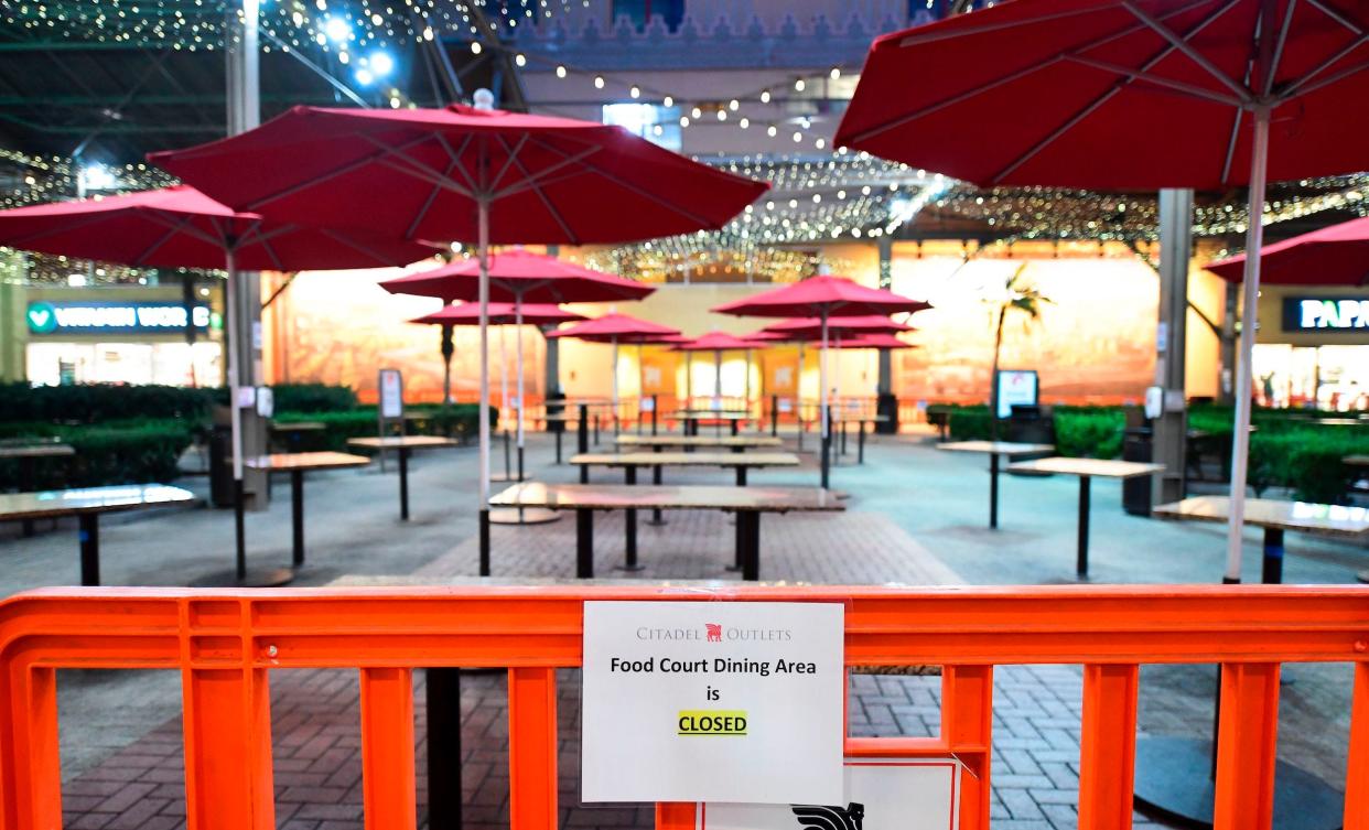 Outdoor dining is closed at the Citadel Outlets in Los Angeles, California on November 30, 2020, after Los Angeles County banned outdoor dining in an attempt to stem the latest surge in coronavirus cases.