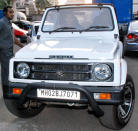 John loves speed and power and here he rides a Maruti Gypsy