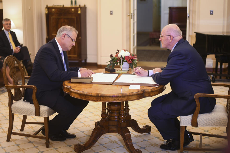 Scott Morrison is sworn in by the Governor-General Sir Peter Cosgrove. Source: AAP