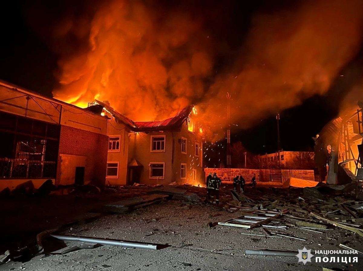 Firefighters work at a site where production facilities were damaged during a Russian drone strike near Bila Tserkva city, in Kyiv region. Picture released January 30, 2024 (Reuters)