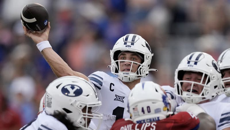 BYU quarterback Kedon Slovis (10) passes the ball during the second half of an NCAA college football game against Kansas Saturday, Sept. 23, 2023, in Lawrence, Kan. Kansas won 38-27. 