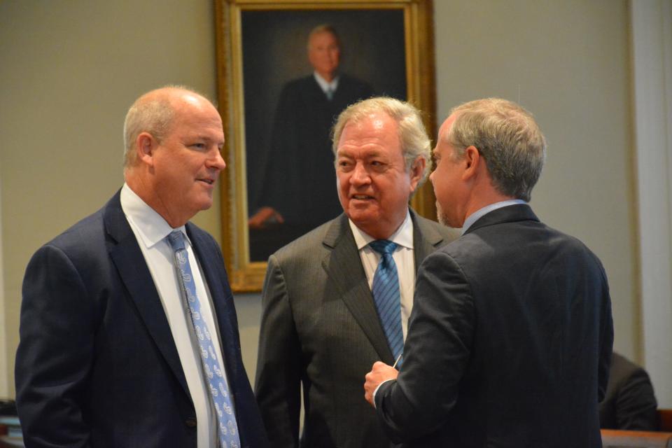From left are Murdaugh attorneys Jim Griffin and Richard Harpootlian, discussing the case with Creighton Waters of the S.C. Attorney General's Office.
