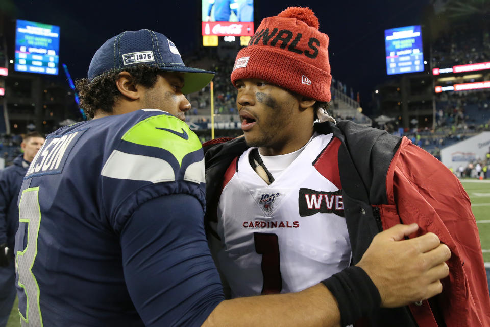 SEATTLE, WASHINGTON - DECEMBER 22: Russell Wilson #3 of the Seattle Seahawks and Kyler Murray #1 of the Arizona Cardinals hug after the Arizona Cardinals defeated the Seattle Seahawks 27-13 during their game at CenturyLink Field on December 22, 2019 in Seattle, Washington. (Photo by Abbie Parr/Getty Images)