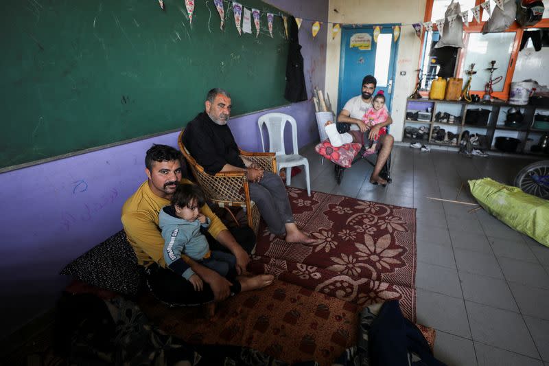 Displaced Palestinian Abu Alkas family take shelter in a school, in Gaza City