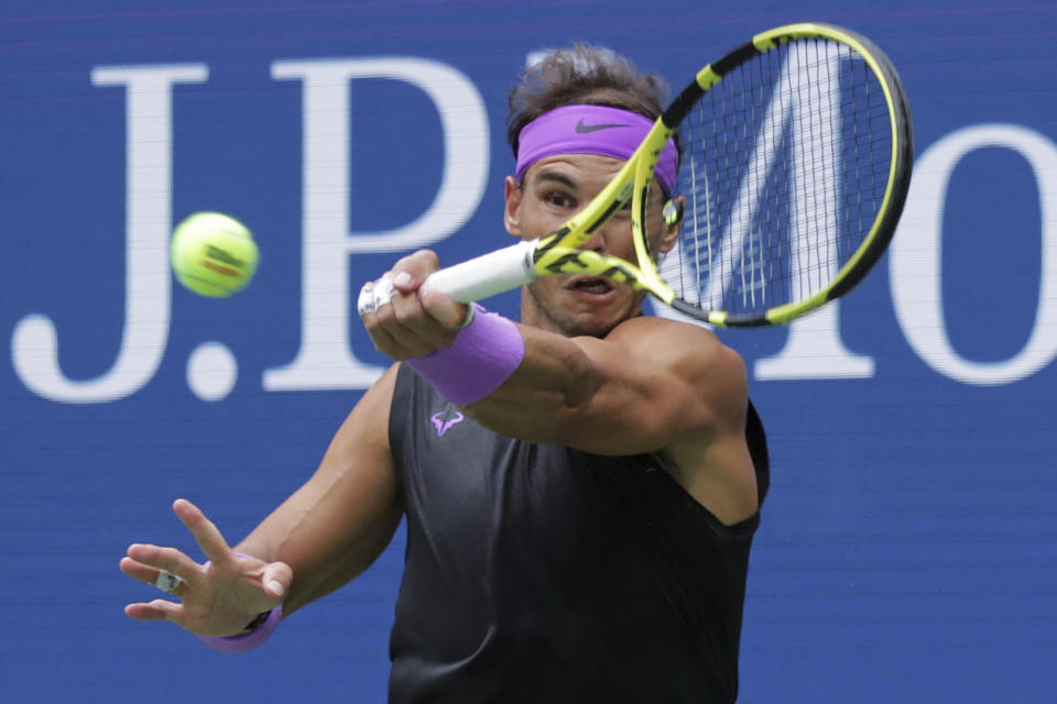 Rafael Nadal, of Spain, returns a shot to Daniil Medvedev, of Russia, during the men's singles final of the U.S. Open tennis championships Sunday, Sept. 8, 2019, in New York. (AP Photo/Charles Krupa)