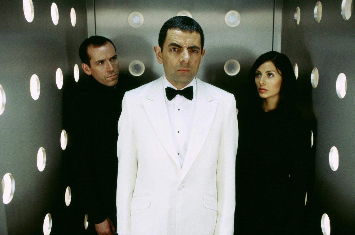 Ben Miller, Rowan Atkinson & Natalie Imbruglia in 2003's Johnny English. (Alamy)