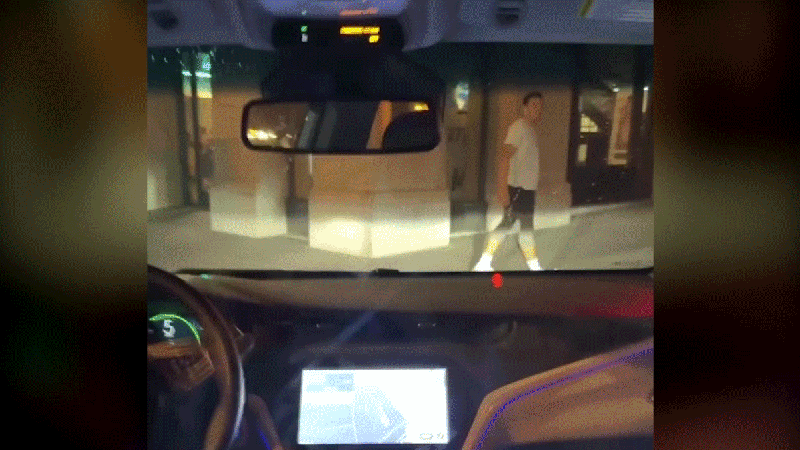 The passenger's view of a robotaxi swerves towards a swerving towards the sidewalk.