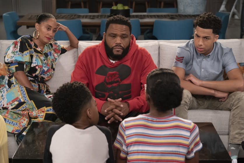 BLACK-ISH - "Purple Rain" - The family is shocked to learn that Jack and Diane are not familiar with the iconic music of Prince. One by one, each member of the family works to explain Prince's tremendous impact on their lives through his music, on the 100th episode of "black-ish," TUESDAY, NOV. 13 (9:00-9:30 p.m. EST), on The ABC Television Network. (ABC/Eric McCandless) TRACEE ELLIS ROSS, ANTHONY ANDERSON, MARCUS SCRIBNER