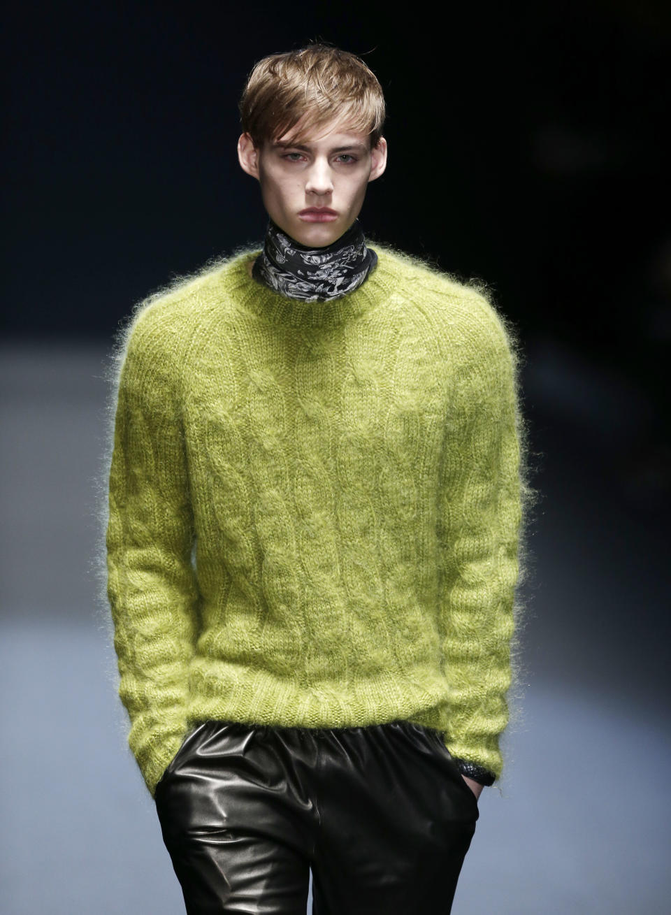 A model wears a creation for Gucci men's Fall-Winter 2013-14 collection, part of the Milan Fashion Week, unveiled in Milan, Italy, Monday, Jan. 14, 2013. (AP Photo/Antonio Calanni)