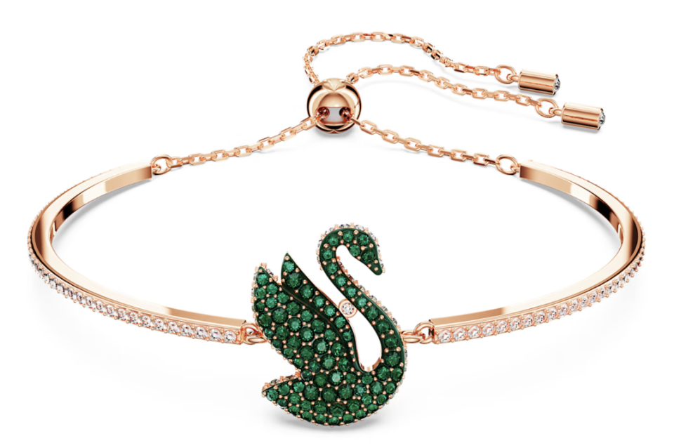 Swarovski Iconic Swan bangle, Green, Rose gold-tone plated. PHOTO: Swarovski