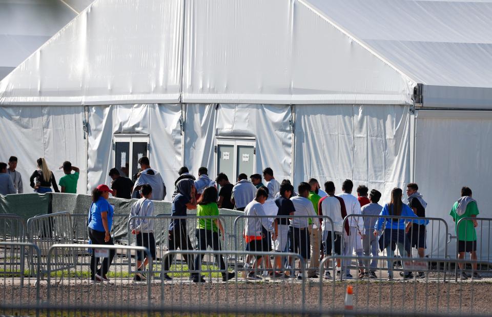 Children line up to enter the Homestead Temporary Shelter for Unaccompanied Children in Homestead, Fla., in February 2019.