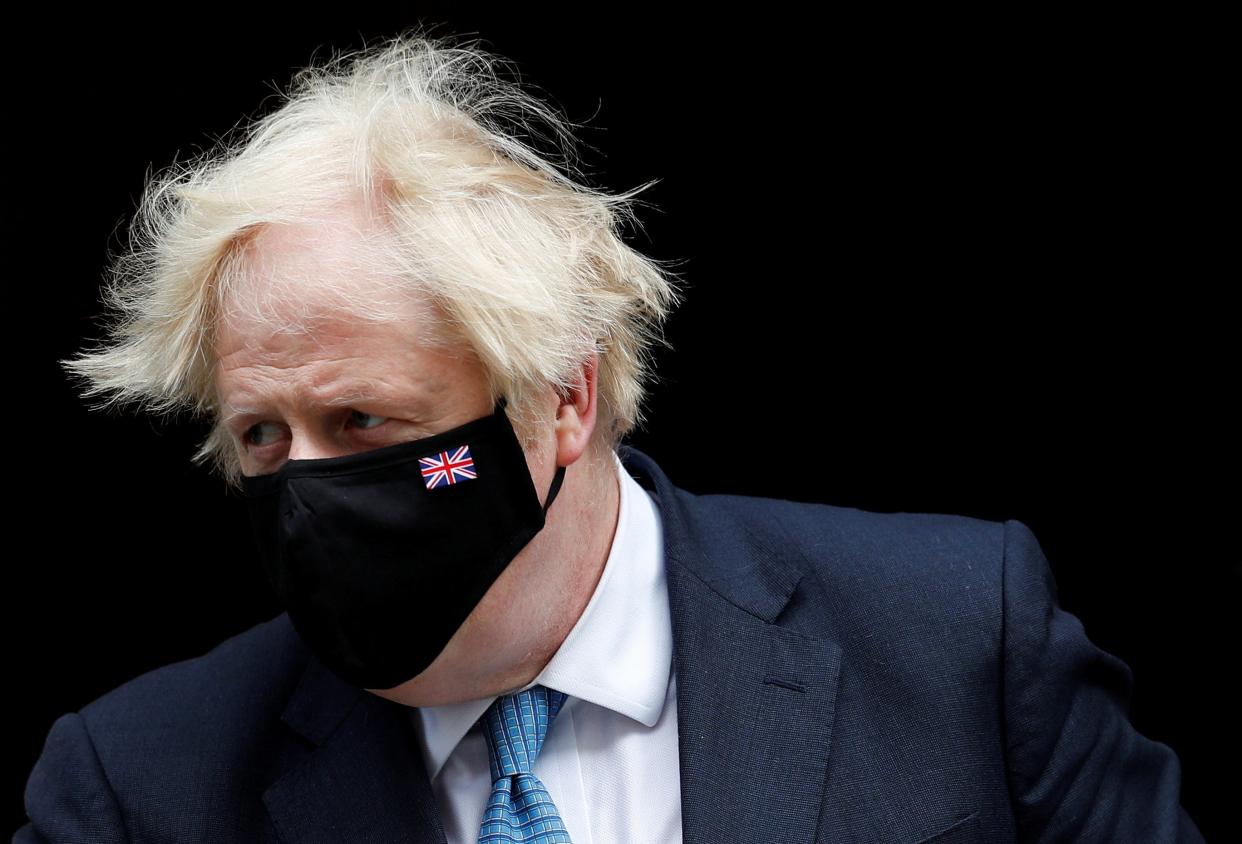 A Conservative revolt is threatening Boris Johnson’s plans to introduce domestic vaccine passports  (Reuters)