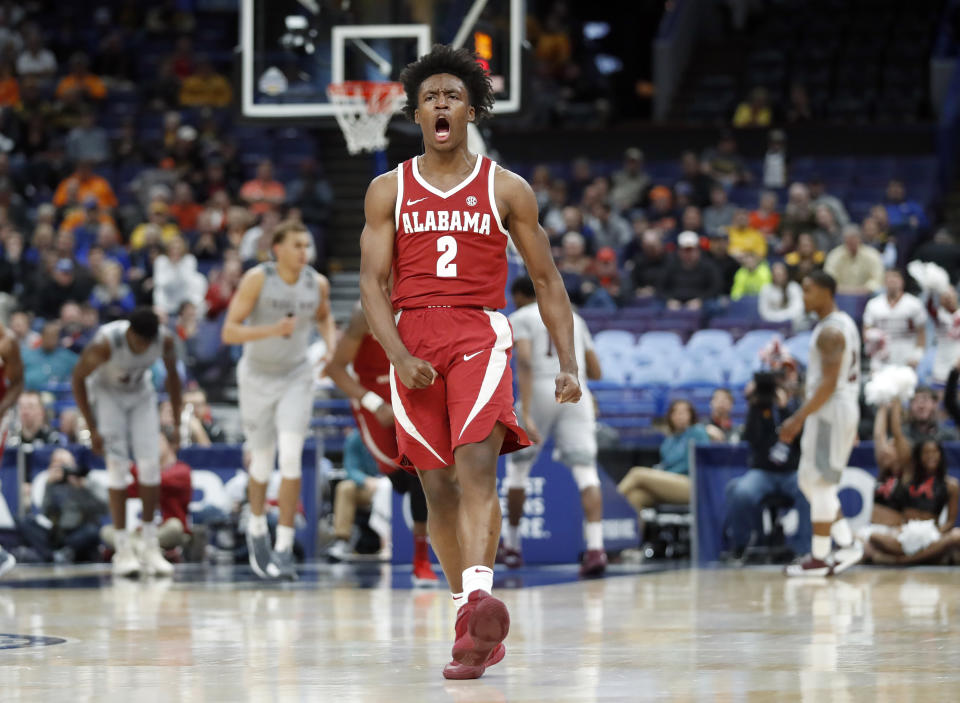 Alabama’s Collin Sexton celebrates after a teammate’s basket during the second half in an NCAA college basketball game against Texas A&M at the Southeastern Conference tournament Thursday, March 8, 2018, in St. Louis. Alabama won 71-70. (AP Photo/Jeff Roberson)