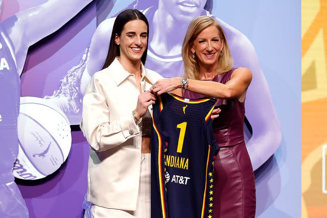 <p>Sarah Stier/Getty</p> Caitlin Clark poses with WNBA Commissioner Cathy Engelbert after being selected first overall pick by the Indiana Fever during the 2024 WNBA Draft at Brooklyn Academy of Music on April 15, 2024 in New York City.