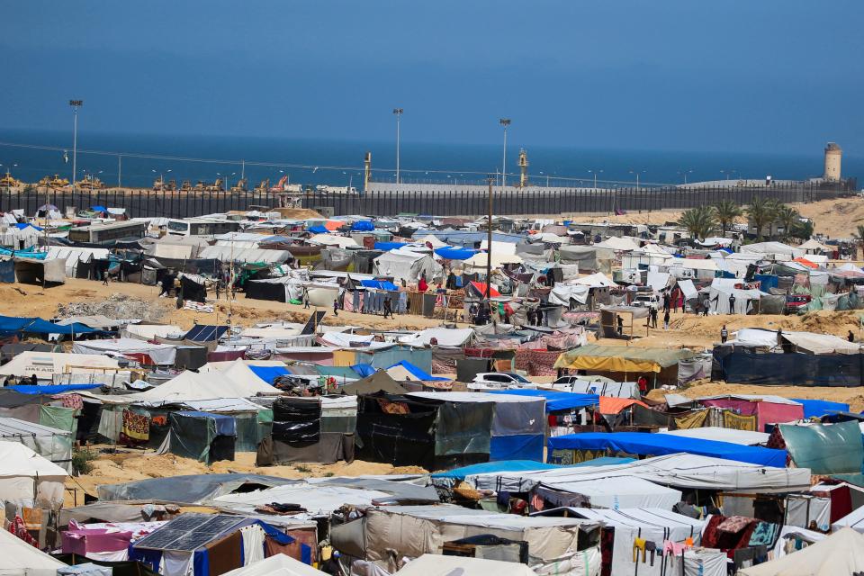 Tents are set up by displaced Palestinians in al-Mawasi near the border with Egypt in Rafah in the southern Gaza Strip on May 9, 2024.