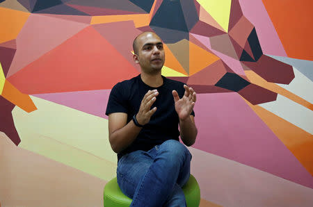 Manu Kumar Jain, Managing Director of Xiaomi India, gestures as he speaks during an interview with Reuters inside his office in Bengaluru, India, January 18, 2018. Picture taken January 18, 2018. REUTERS/Abhishek N. Chinnappa