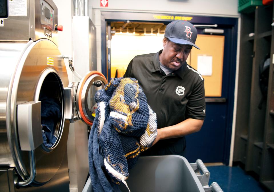 Craig Baugh cleans the team's laundry after a Predators' practice at Bridgestone Arena on Tuesday, Dec. 10, 2019. Baugh has been with the Predators as a clubhouse assistant since they began the franchise.