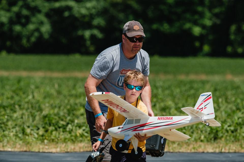 A child readies his aircraft during ‘Flite Fest’ in Malvern, Friday, June 24.