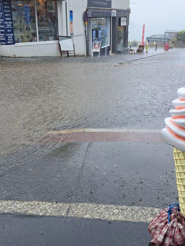 NEWQUAY: Handout photo taken with permission from the Twitter feed of @opheliaspromise of flooding on Marcus Hill in Newquay. (Photo: @opheliaspromise via PA Media)