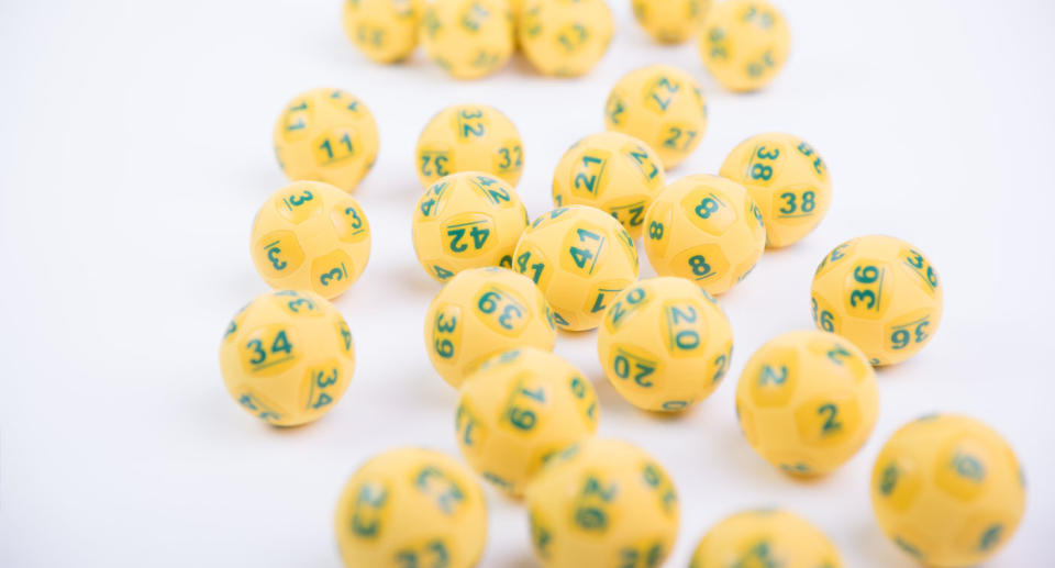 Yellow and green Oz Lotto balls. 