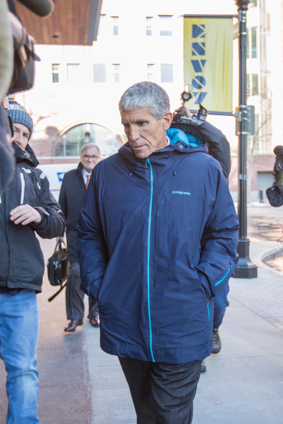 William "Rick" Singer leaves Boston Federal Court after being charged with racketeering conspiracy, money laundering conspiracy, conspiracy to defraud the United States, and obstruction of justice on March 12, 2019 in Boston, Massachusetts.