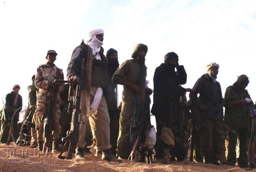 A handout picture released by the Azawad National Liberation Movement (MLNA) on taken in February shows MNLA fighters in Mali. Tuareg rebels, militias and Islamist groups are committing war crimes in Mali's lawless north, including summary executions and rapes, Human Rights Watch says